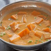 Yellow Curry · Sweet potato, green peas and coconut milk in yellow curry paste.