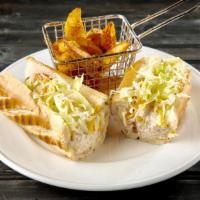 Tuna Baguette · Longfin tuna tossed in mayo, lemon, and celery. Served with tomatoes, and celery. Served wit...