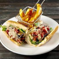 Philly Bello Baguette · Portobello mushrooms and fire-roasted red peppers sautéed in pesto oil, with baby spinach an...