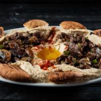 Hommous & Steak · Our famous hummus with beef tenderloin, mushroom, green pepper and onion.