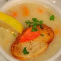 Lemon Chicken & Rice Soup · A savory and slightly tangy chicken soup with carrots, onion, celery, basmati rice and lemon...