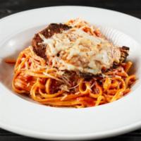Chicken Parmesan · Breaded chicken breast topped with marinara sauce, Parmesan cheese and mozzarella cheese. Se...