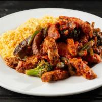 Garden Chicken Cacciatore · Grilled chicken sautéed in our house marinara sauce with green and red peppers, Portobello m...