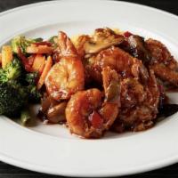 Firecracker Shrimp · Large gulf shrimp lightly floured and fried tossed with sautéed roasted red peppers and mush...
