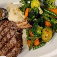 12 Oz. Prime Ribeye Steak · Creekstone Farms Ribeye Steak grilled to your choice of temperature, served mashed potatoes,...