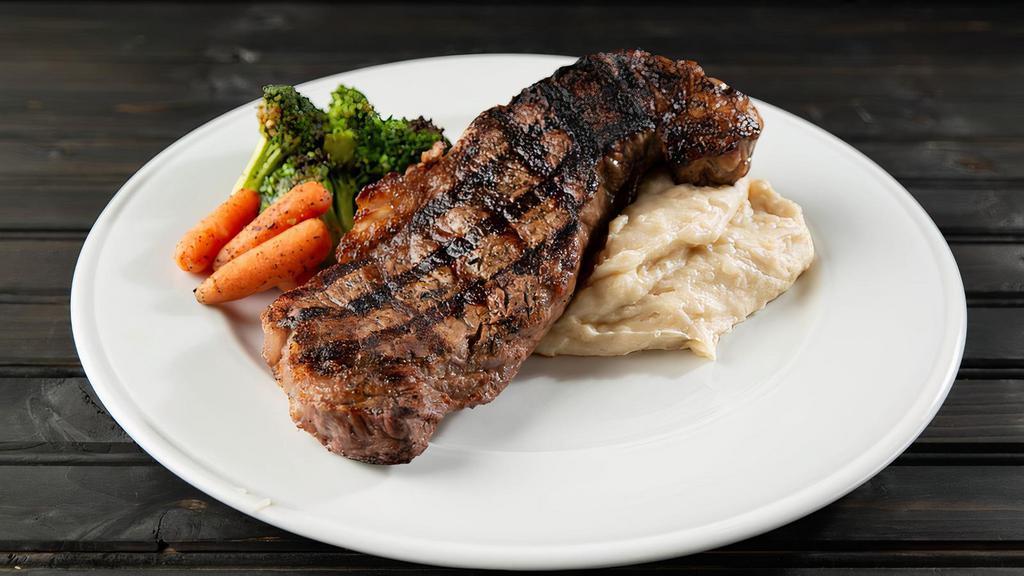 Creekstone N.Y. Strip · Creekstone Farms 12oz USDA Prime grade halal-certified strip steak, charbroiled and served with mashed potatoes and chef’s sautéed vegetables. Zip sauce.
