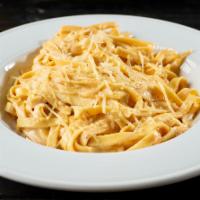 Fettuccine Alfredo · Fettuccine noodles tossed in our house-made alfredo sauce and topped with shredded Parmesan ...