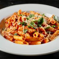 Penne Palomino · Penne noodles fresh basil tossed in our housemade palomino sauce (a creamy marinara) and top...