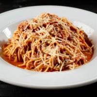 Spaghetti Bolognese · Spaghetti noodles tossed in our house-made Bolognese meat sauce, topped with Shredded Parmes...