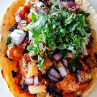 Chicken · Grilled adobo marinated chicken thighs, salsa roja, chihuahua cheese, red onion, cilantro.