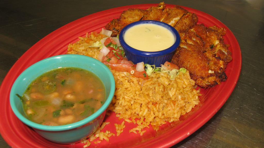 Pollo Con Chorizo · Two crispy, breaded chicken breasts stuffed with chorizo, poblano peppers, onions, and Monterey jack cheese served with creamy queso on the side. Served with Mexican rice and your choice of refried, borracho or black beans.
