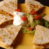 Lunch Quesadilla · A large flour tortilla stuffed with melted cheese and your choice of fajita chicken, fajita ...