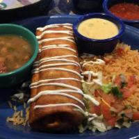 Lunch Chimichanga · Your choice of seasoned ground beef or fajita chicken rolled into a crispy flour tortilla an...