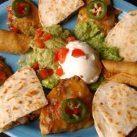 Los Cabos Sampler · A sampling of chicken flautas, steak nachos, and fajita chicken quesadillas. Served with sou...