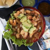 Ceviche · A combination of shrimp, scallops, and tilapia with tomatoes, onions, avocado, cilantro, and...