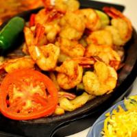 Shrimp Fajitas · Fresh gulf shrimp dusted with Cabo special seasoning and blazed on the grill with bell peppe...