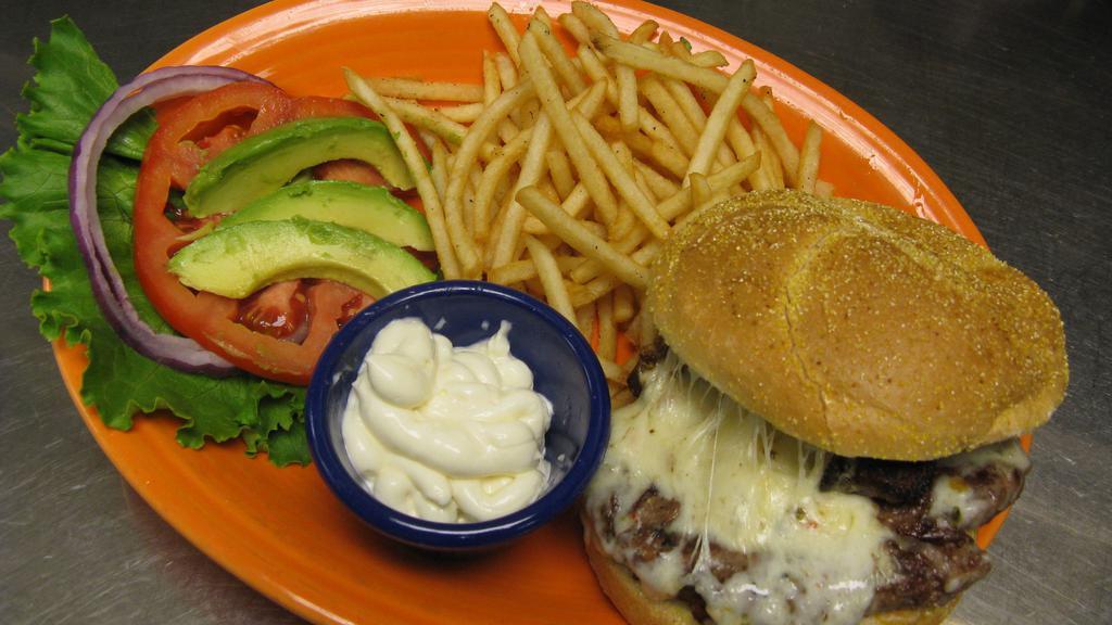 Mexi-Burger · A half-pound, premium grilled burger topped with jalapeño bacon, pepper jack cheese, avocado, onion, tomato, and lettuce. Served with fries.