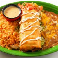 Chimichanga · Your choice of seasoned ground beef or fajita chicken with shredded cheese folded into a flo...