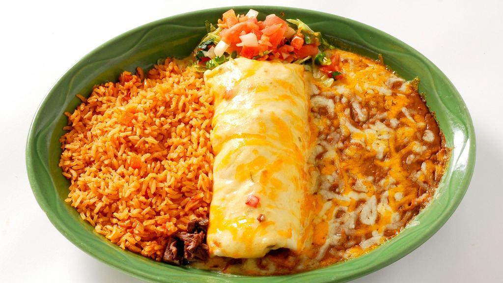 Cheeseburger Burrito · A fresh flour tortilla filled with seasoned ground beef and shredded cheese. Topped with your choice of queso or chili con carne.