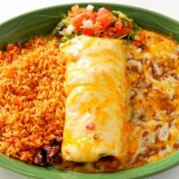 Carnitas Burrito · Slow-roasted carnitas, caramelized onions, avocado, pico de gallo and pepper jack cheese stu...