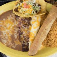 Cancun · A fajita chicken enchilada, one chicken flauta, a crispy beef taco, and a handmade chicken t...