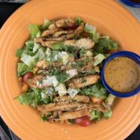 Southwestern Chicken Salad · Fresh chopped romaine with homemade cilantro-lime dressing, green onions, red bell peppers, ...