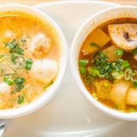 Tom Yum · (Pictured on Right) Chicken, onions, green onions, cilantro and mushrooms in spicy & sour br...