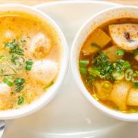 Tom Kha Gai · (Pictured on Left) Chicken, mushroom, onion, green onion and cilantro in herbal coconut broth.