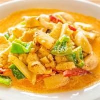 Gang Gai · Sauteed chicken, bell pepper, bamboo shoot, mushroom and sweet basil in red coconut curry sa...