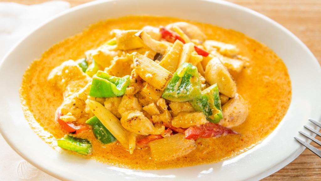 Gang Gai · Sauteed chicken, bell pepper, bamboo shoot, mushroom and sweet basil in red coconut curry sauce. This dish is prepared MILD.