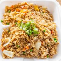 Kow Pad · Fried rice with choice of chicken, beef or pork, tomato, onion, pea, carrot and egg.