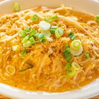 Ch2 Kao Soi · Stir-fried rice noodles, with your choice of meat, bean sprouts in red curry sauce, topped w...