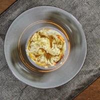 Hummus · Chickpeas, tahini, garlic served with pita or vegetables. Gluten-free.