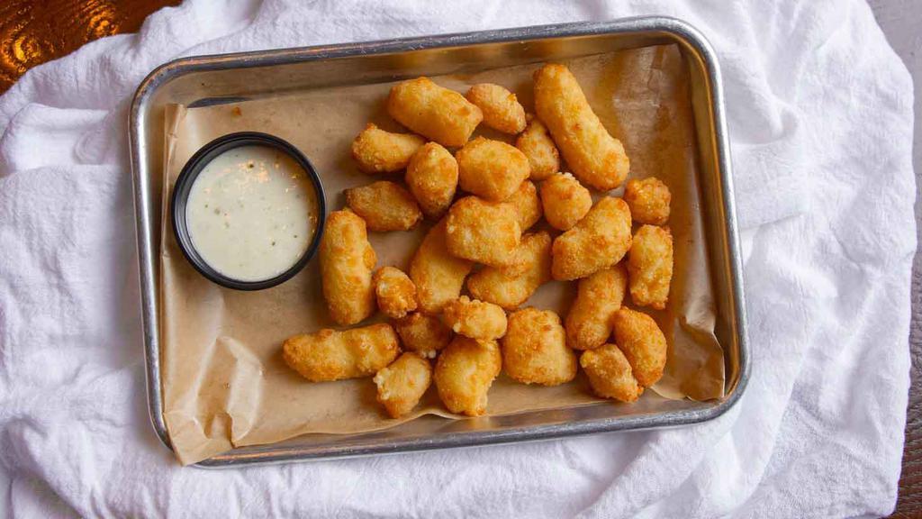 Cheese Curds · A local favorite, wisconsin cheese curds deep fried. Served with ranch dressing.