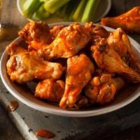 (12) Jumbo Wings · Choose two sauce flavors. Fresh never pre-cooked jumbo chicken wings.