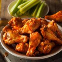 (24) Jumbo Wings · Choose four sauce flavors. Fresh never pre-cooked jumbo chicken wings.