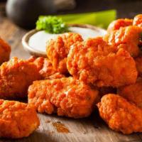 (6) Boneless Wings · Choose one sauce flavor. Fresh, never pre-cooked. All white meat chicken, lightly breaded, a...