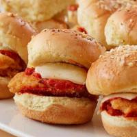 Chicken Parm Sliders · Deep fried chicken breast smothered with marinara sauce and mozzarella cheese. Served with s...