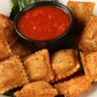 Fried Ravioli · Lightly breaded & toasted ravioli stuffed with Italian sausage & blended cheeses.