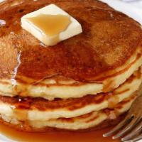 Pancakes · Three house recipe buttermilk pancakes, topped with powdered sugar.  served with Maple Syrup...