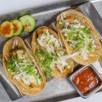 Baja Tacos · Mahi-Mahi, avocado, Baja sauce, cilantro, radish, slaw, salsa, lime, corn tortillas, 3 per o...