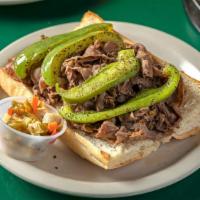 Italian Beef · Seasoned slow roasted beef, thinly cut, and dipped in our deliciously prepared au jus.  Serv...