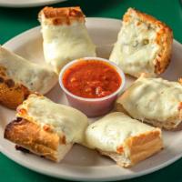Cheese Garlic Bread · Try with our marinara or pizza dipping sauce for an additional charge.