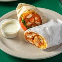 Chicken Caesar Wrap · Char-grilled seasoned breast of chicken, tossed in our caesar salad with parmesan cheese on ...