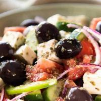 Greek Salad · Lettuce, tomatoes, onions, beets, cucumbers, olives, mild peppers and Feta cheese.