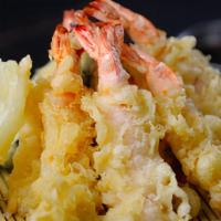 Shrimp Tempura · Eight pieces of jumbo shrimp fried in a and crispy tempura batter. An assortment of fried on...