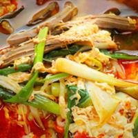 Yuk Gae Jang · Julienned beef brisket with shiitake mushrooms, bean sprouts, scallions, whisked egg and cle...