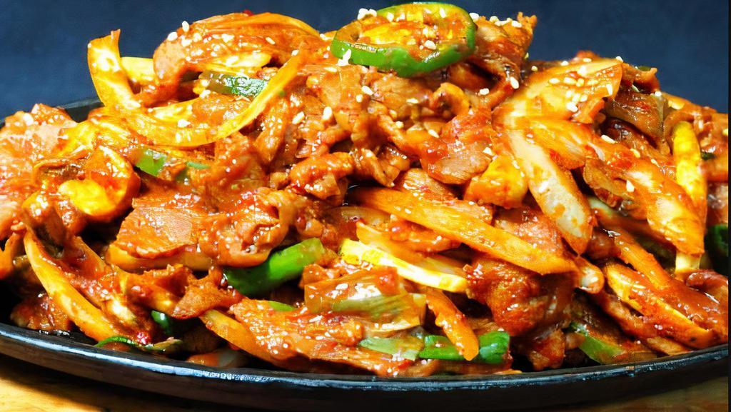 Jeyuk Bokkeum · Tender marinated pork, onions, scallions, mushrooms and jalapenos stir fried in a spicy gochu garlic sauce.