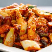 Dak Bokkeum · White chicken breast, zucchini, carrots, onions and mushrooms sautéed in a red chili sauce.