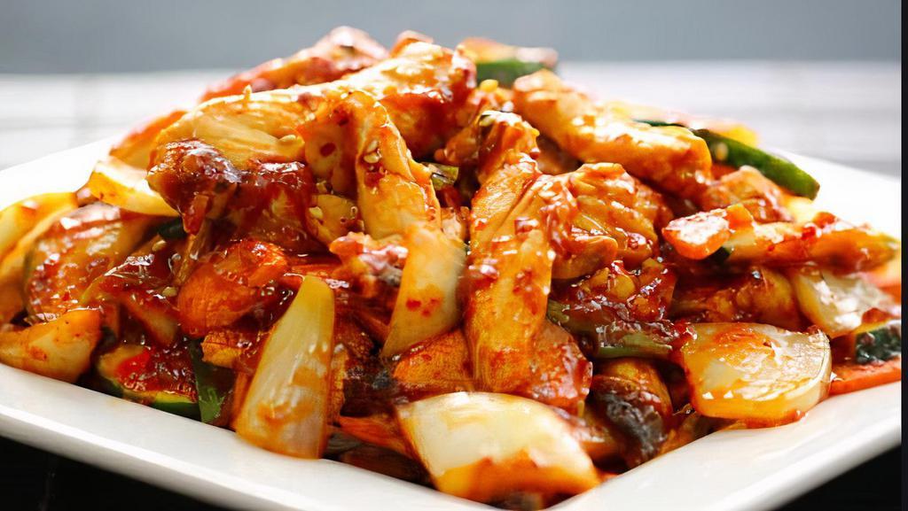 Dak Bokkeum · White chicken breast, zucchini, carrots, onions and mushrooms sautéed in a red chili sauce.